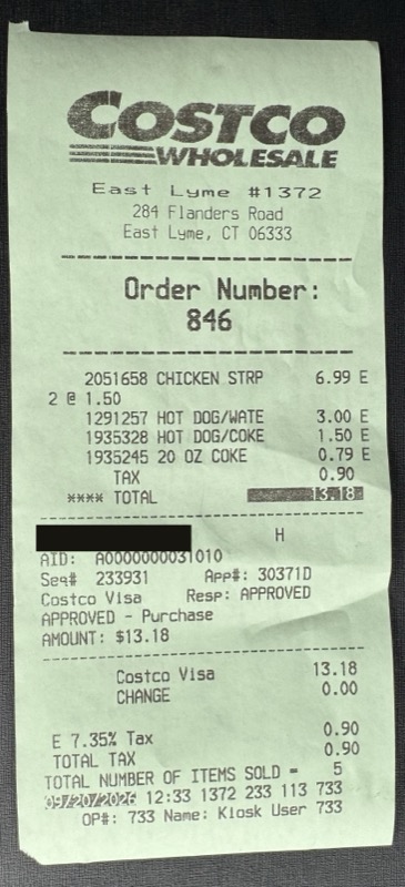 The food court receipt, with the card number blacked out.